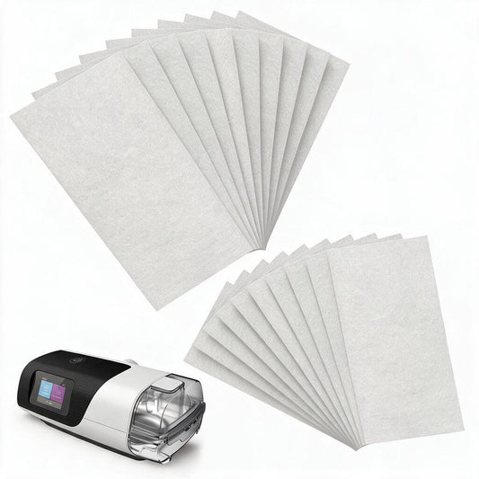 Two sets of white pleated filter cartridges shown fanned out next to a white and black portable oxygen concentrator on a clean white background.