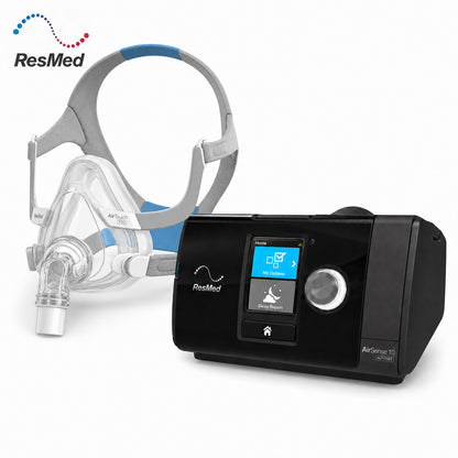ResMed AirSense 10 CPAP machine in black with a color display screen and control buttons, shown alongside a clear and gray sleep mask with blue accents on a white background.