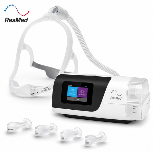 ResMed CPAP machine with a white and black control unit, connected tubing, clear mask headgear, and four clear nasal pillows on a white background.