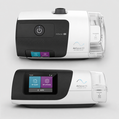 Two AirSense 11 Nebulizer Plus devices shown from the front on a light gray background, one with the power button on and one with the touch screen active.